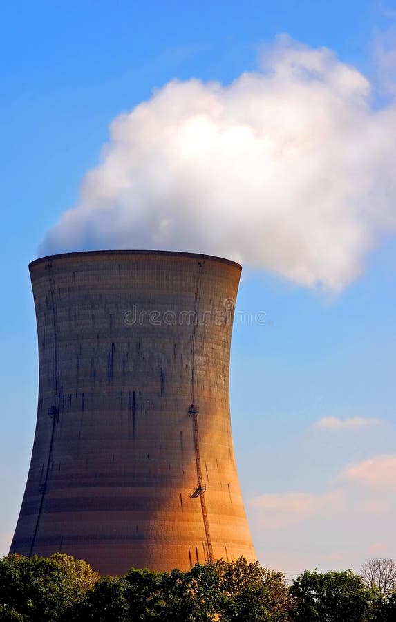 Steam rises from a nuclear cooling tower. Steam rises from a nuclear cooling tower