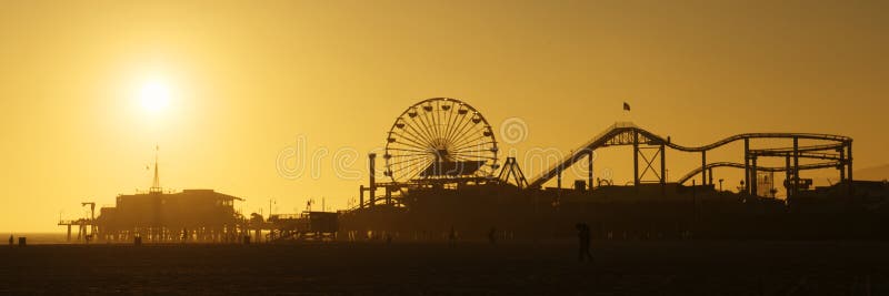 Kerstman Monica Pier bij zonsondergang stock foto's Kerstman Monica Pier bij zonsondergang stock foto's