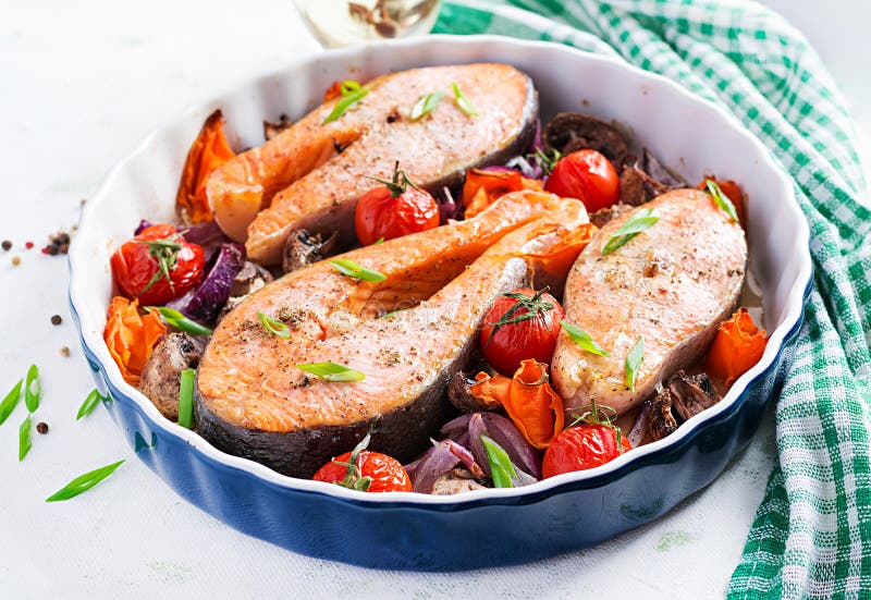 Baked Salmon Fish Steak with Tomatoes, Mushrooms and Red Onions. Stock ...