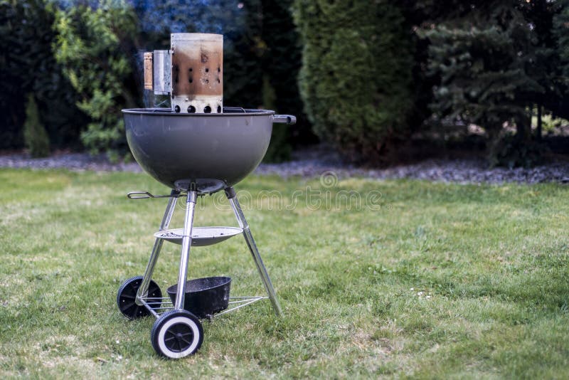 Kettle Barbecue Charcoal Grill Roasting Standing on Gras Ready Action Stock Image - Image of grilling, heat: 90128225