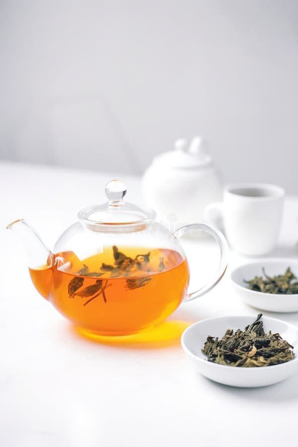 Kettle and Cup of Highend Tea, Warm, on a White Table, Product Photography Stock Illustration