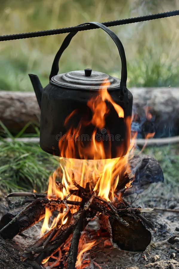 Kettle on the fire stock photo. Image of food, fuel, outdoor 23025372