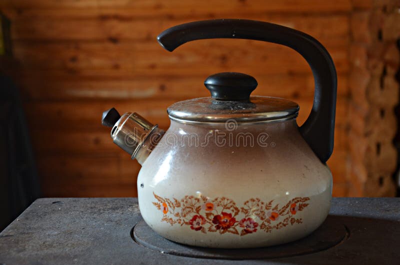 Kettle on the stove stock photo. Image of glow, dated 61370318