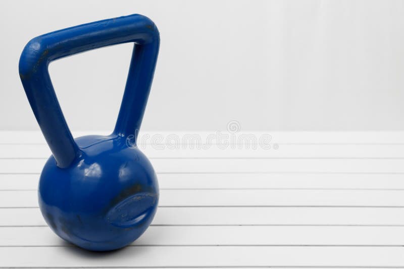 Kettlebell on a white wooden floor