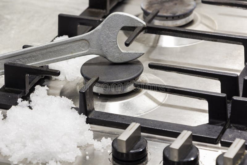 Repair gas stove stock image. Image of burner, manual 32081913