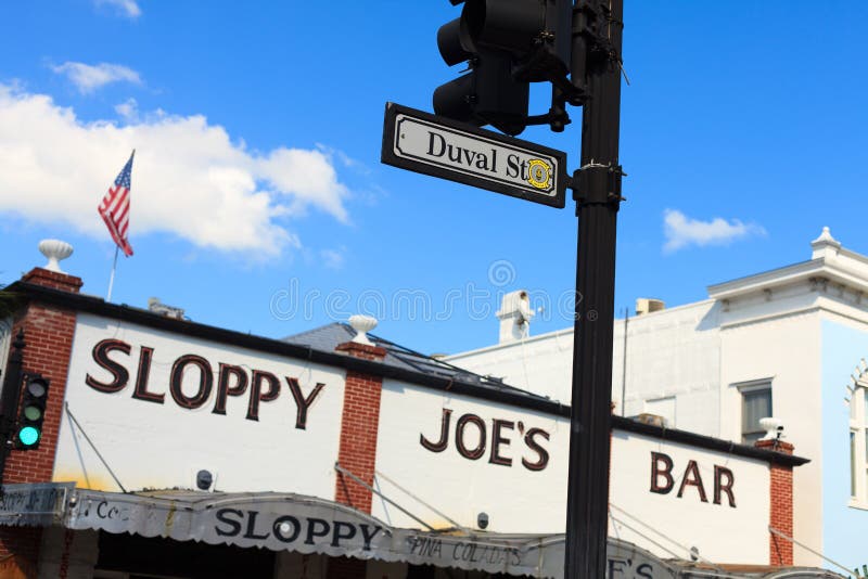 KEY WEST, FLORIDA â€“ APRIL 25: The famous Sloppy Joe's Bar on Duval Street where American author and journalist Ernest Hemingway frequently attended on April 25, 2012 in Key West. KEY WEST, FLORIDA â€“ APRIL 25: The famous Sloppy Joe's Bar on Duval Street where American author and journalist Ernest Hemingway frequently attended on April 25, 2012 in Key West.