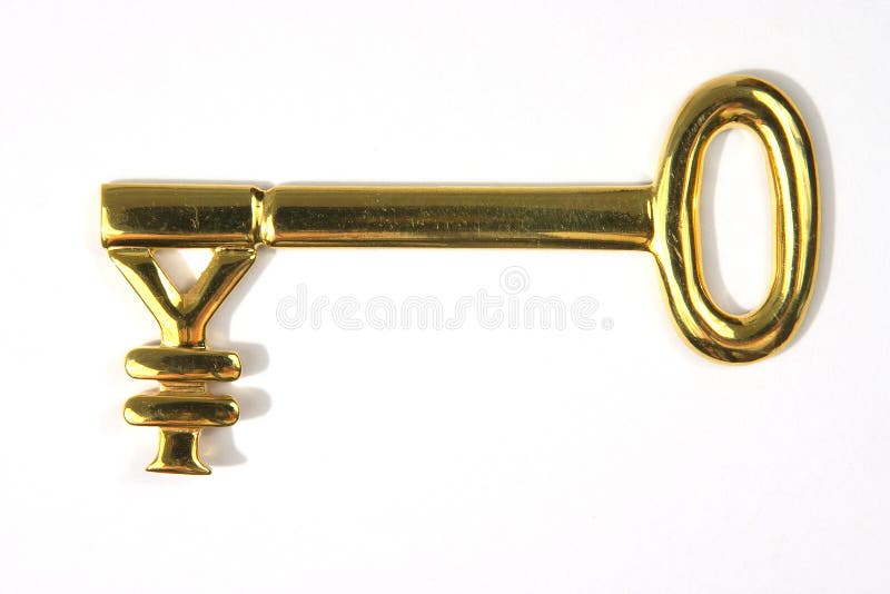 A 22k gold key with a yen symbol on the end of it. A 22k gold key with a yen symbol on the end of it.