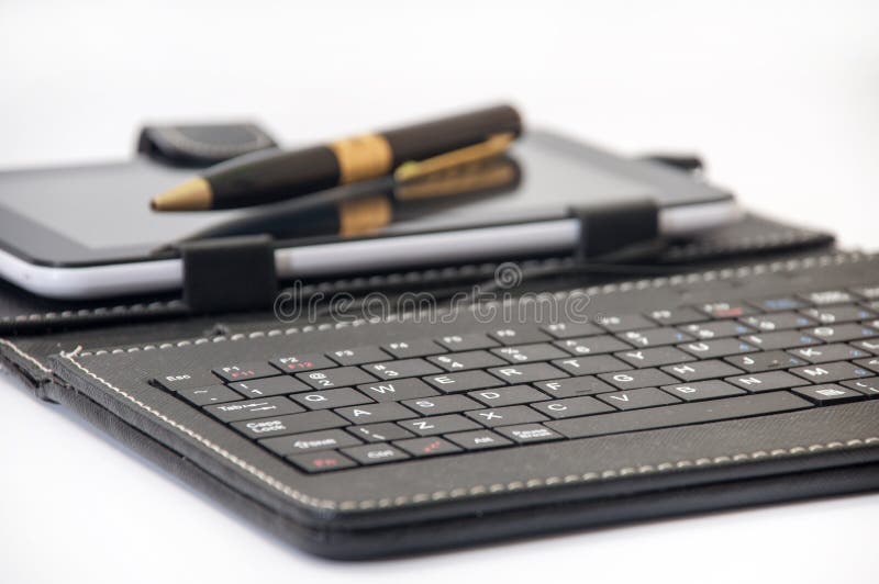 Keyboard for Android in Focus and the Tablet Background Stock Image