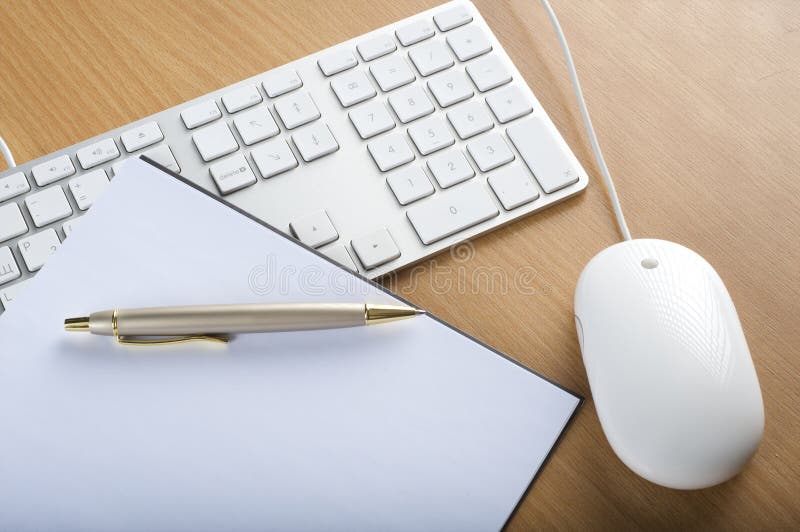 Keyboards, mouse and notebook royalty free stock photos