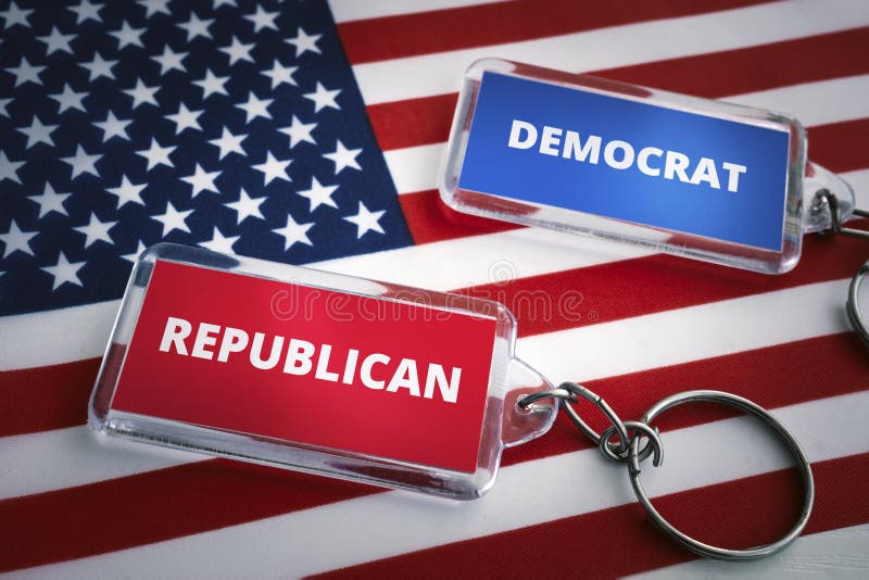 keychain of the Republican Party and the Democratic Party on the background of the US flag. Opposition of Republicans and