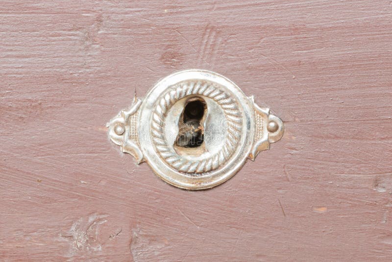 Keyhole of old lock on a chest royalty free stock photos