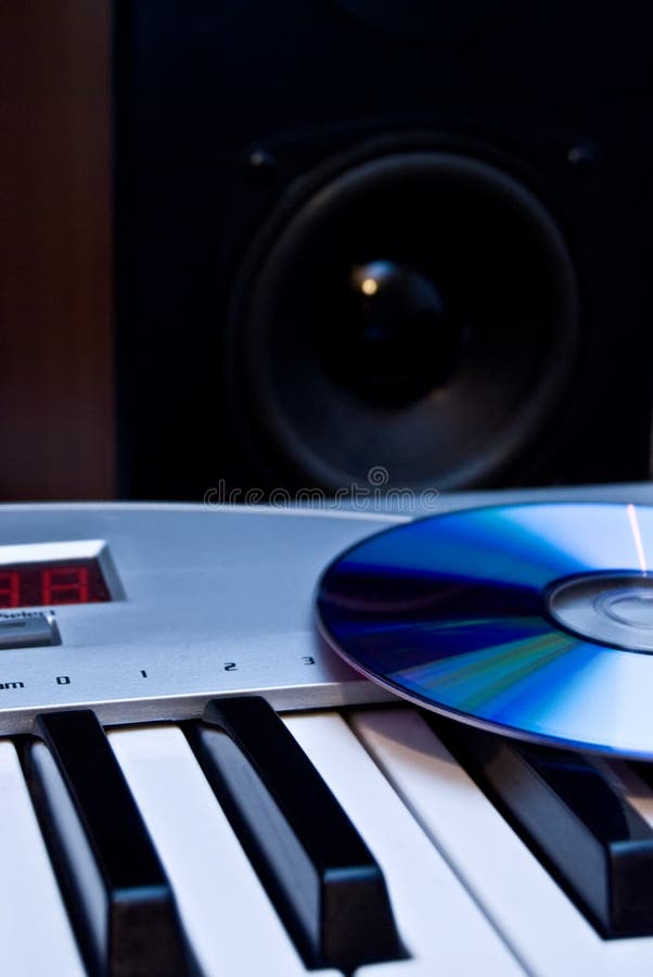 The Keys of Piano, Disk and Loud Speaker Stock Photo Image of play