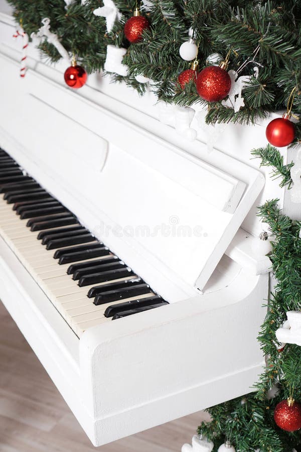 Keys on White Upright Piano with Christmas Decor Stock Photo Image of