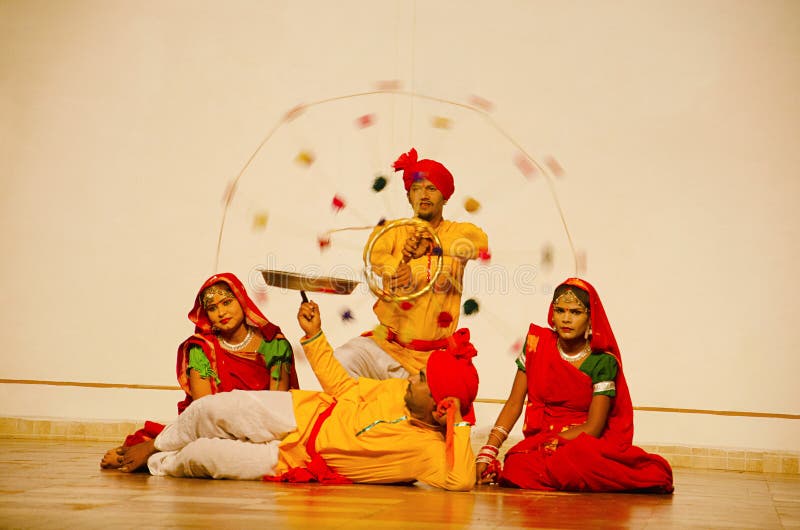 KHAJURAHO, MADHYA PRADESH, INDIA, October 2015, Dancers perform folk dance during folk dance show. royalty free stock photos KHAJURAHO, MADHYA PRADESH, INDIA, October 2015, Dancers perform folk dance during folk dance show. royalty free stock photos