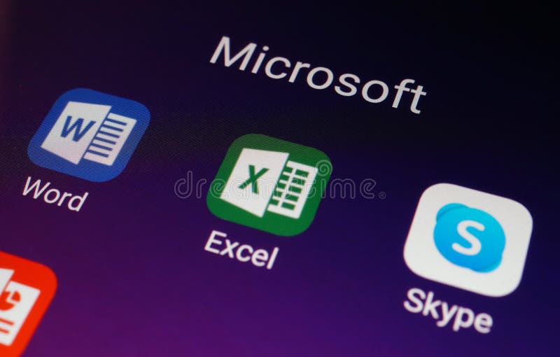 Close up view of Microsoft apps icons on an Android smartphone, including Word, Excel, Skype royalty free stock photography
