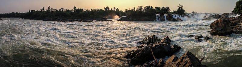 Panoramic view of Khone Phapheng Falls at sundown, Si Phan Don, Champasak Province, Laos stock photography Panoramic view of Khone Phapheng Falls at sundown, Si Phan Don, Champasak Province, Laos stock photography