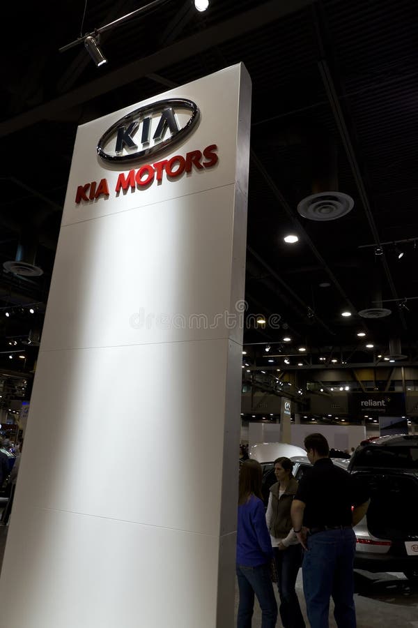 HOUSTON - JANUARY 2012: The KIA Motors display sign at the Houston International Auto Show on January 28, 2012 in Houston, Texas. HOUSTON - JANUARY 2012: The KIA Motors display sign at the Houston International Auto Show on January 28, 2012 in Houston, Texas.