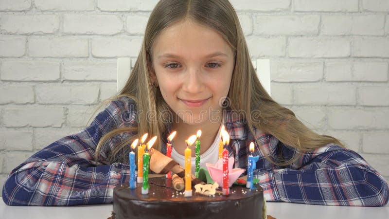 Kid Birthday Party Blowing Candles, Children Anniversary, Child Celebration, Teenager Celebrating stock photos Kid Birthday Party Blowing Candles, Children Anniversary, Child Celebration, Teenager Celebrating stock photos