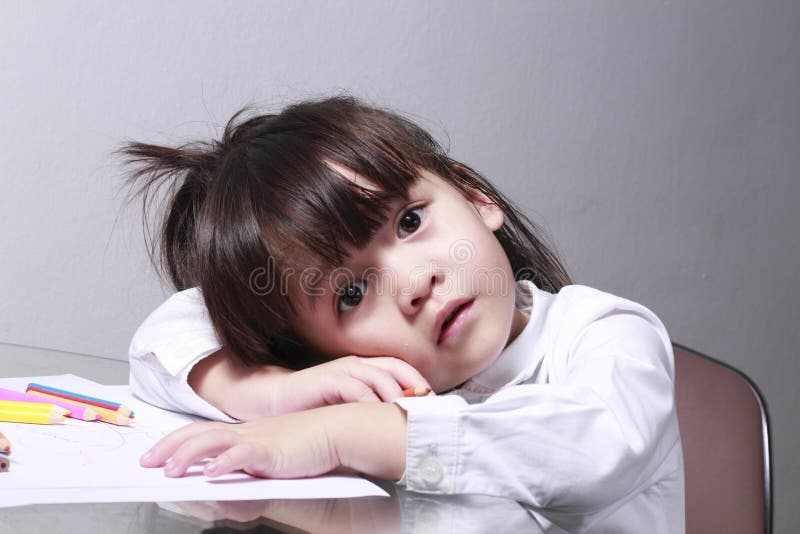 Kid boring to learn need to sleep. Boring kid white stock images, royalty-free photos and pictures