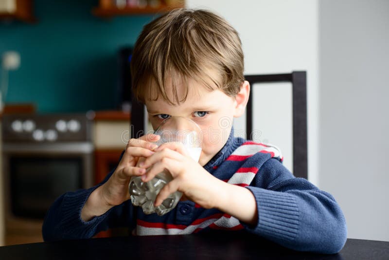 Kid boy drinking milk stock images Kid boy drinking milk stock images