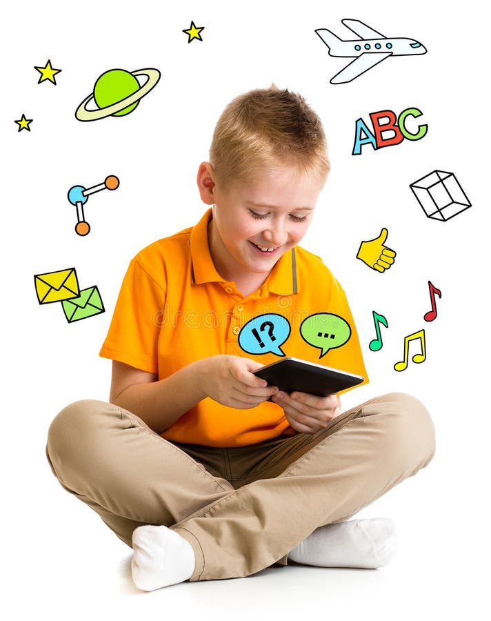 Kid boy sitting with tablet computer and learning or playing