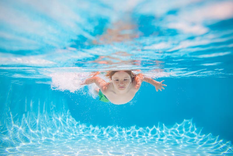 Kid Boy Swimming Underwater on the Beach on Sea in Summer. Blue Ocean ...