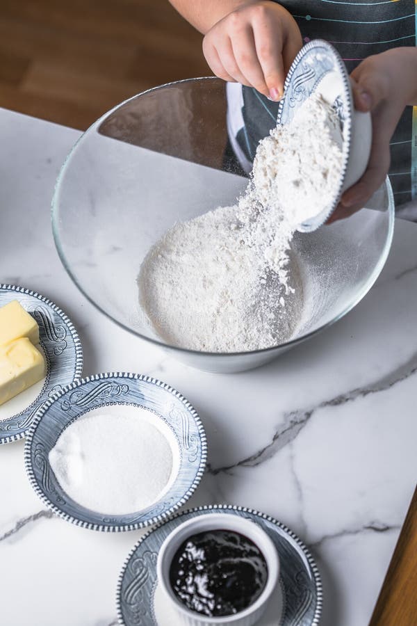 Kid Chef Cook at Kitchen. Child Prepares Food Stock Photo - Image of