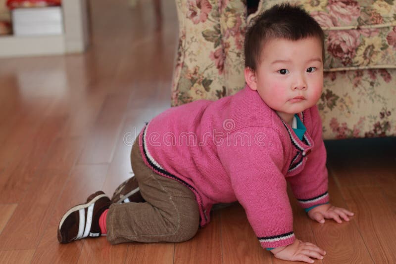 Kid crawling on the floor