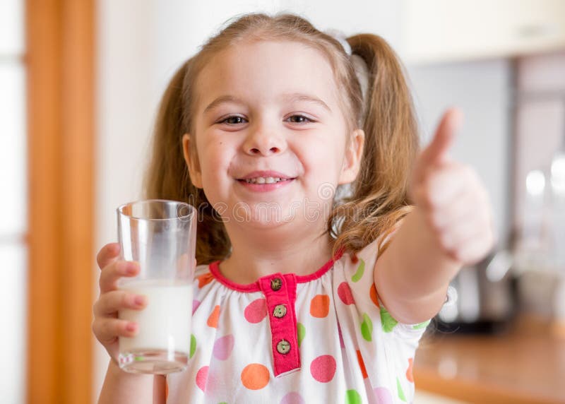 Toddler Girl Drinking Milk From A Bottle Stock Photo, Picture and Royalty  Free Image. Image 102654580.