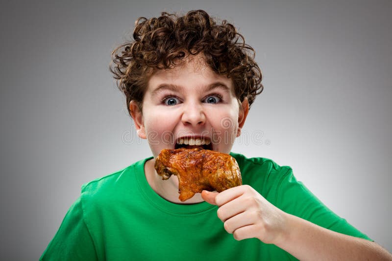 Kid eating chicken leg