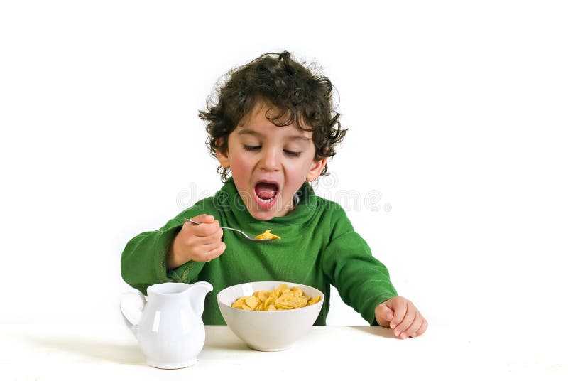 Kid eating cornflakes