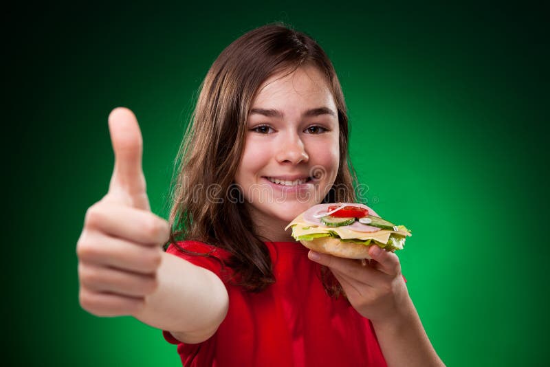 Kid eating healthy sandwiches royalty free stock photo Kid eating healthy sandwiches royalty free stock photo