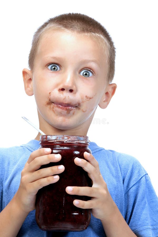 Kid is eating marmelade