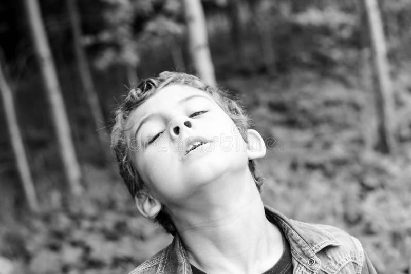 Kid with facial expressions in black and white. Kid with facial expressions in black and white