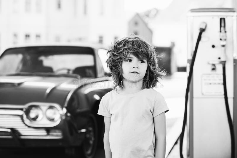 Kid at the Gas Station. Retro Automobile. Stock Photo - Image of race