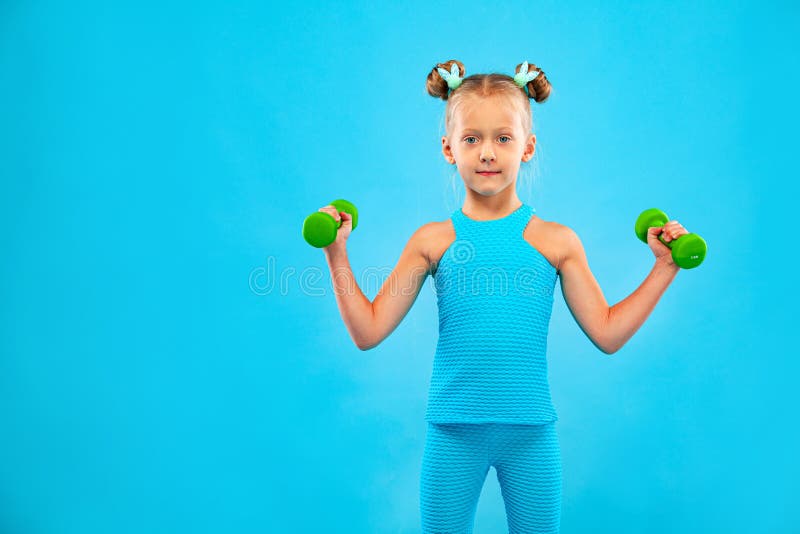 Kid Girl Doing Fitness or Yoga Exercises with Dumbbells Isolated on ...