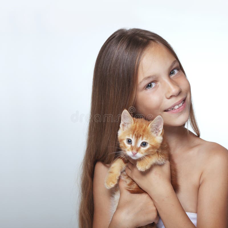 Kid girl with kitten royalty free stock photography Kid girl with kitten royalty free stock photography