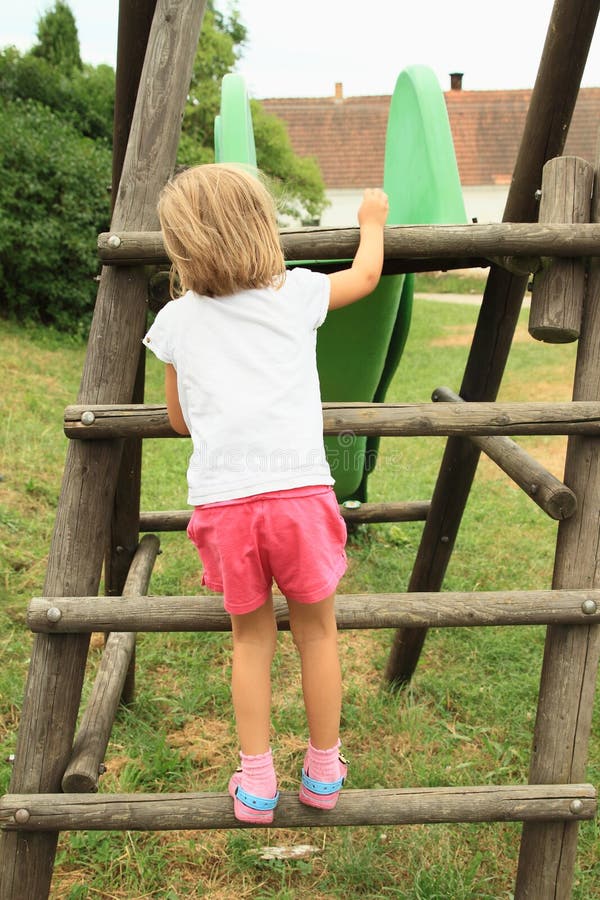Girl Mounting Wooden Construction Stock Image - Image of playground ...
