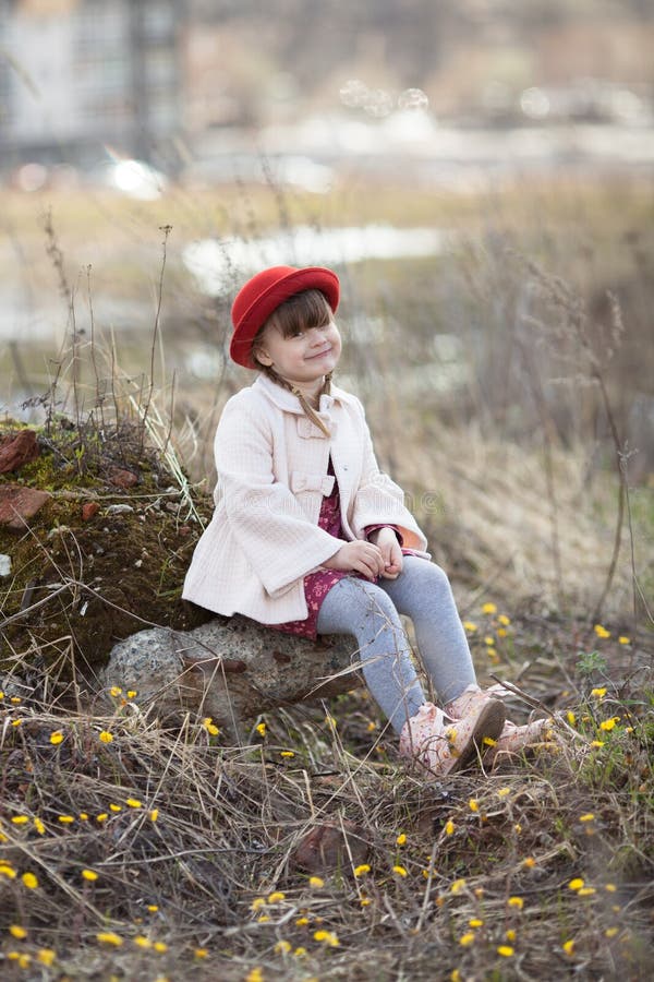 Kid Girl with Pigtails in Hat Walks on Spring Park Stock Image - Image ...