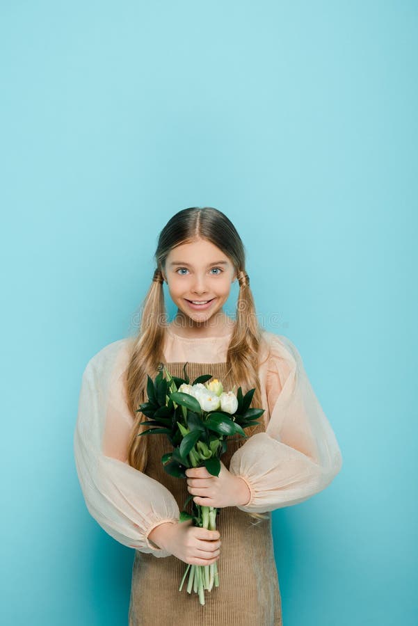 Kid Holding Bouquet of Flowers on Stock Image Image of positive, hold