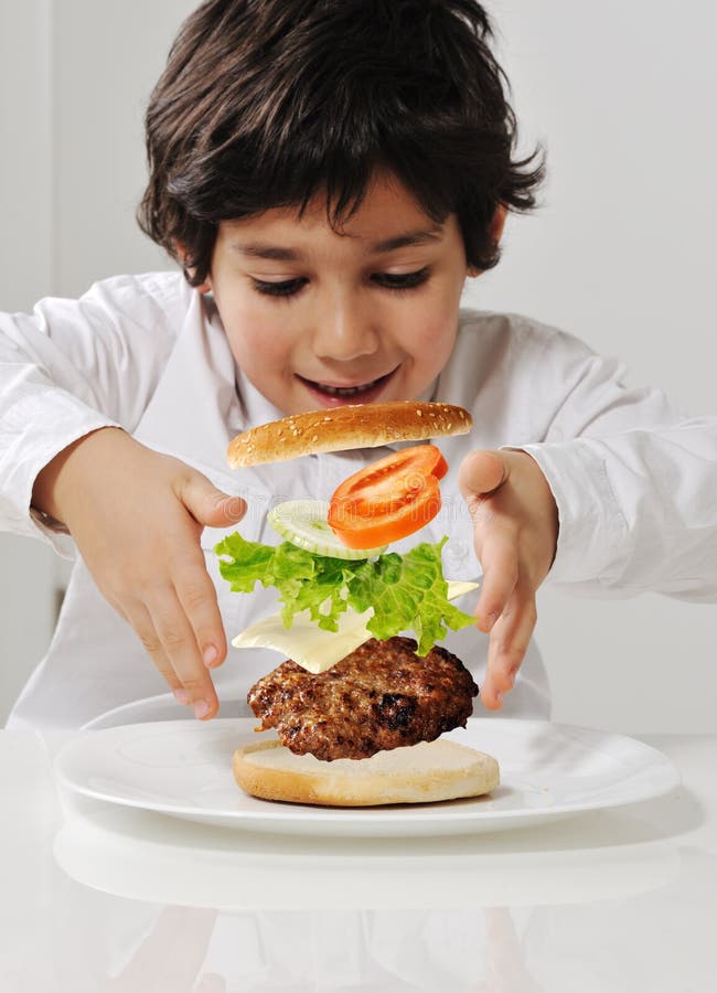 Kid making burger stock image. Image of lettuce, happy 29124259