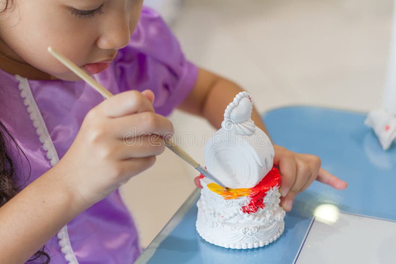 Kid Painting Color on the Plaster Statue Stock Image Image of closeup