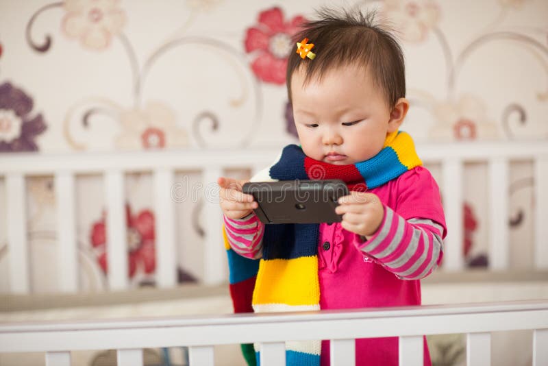 Kid playing cellphone