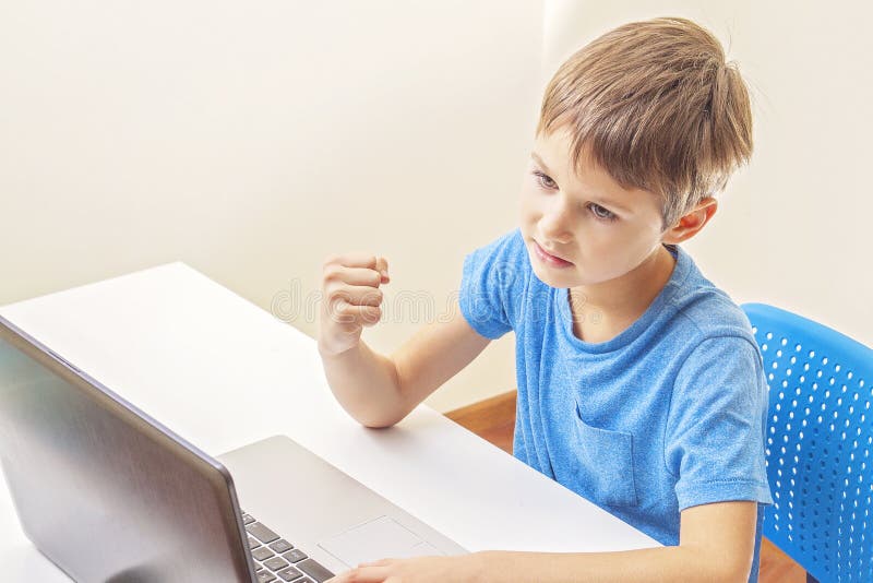 Kid Playing Computer Games With Laptop At Home Stock Image Image Of