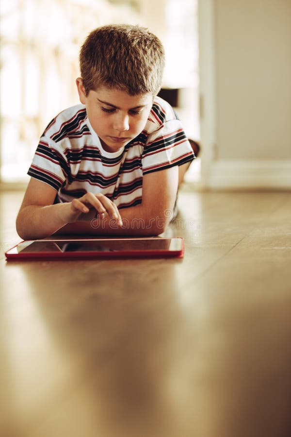 Close Up Of Boy With Tablet Pc Computer At Home Stock Image
