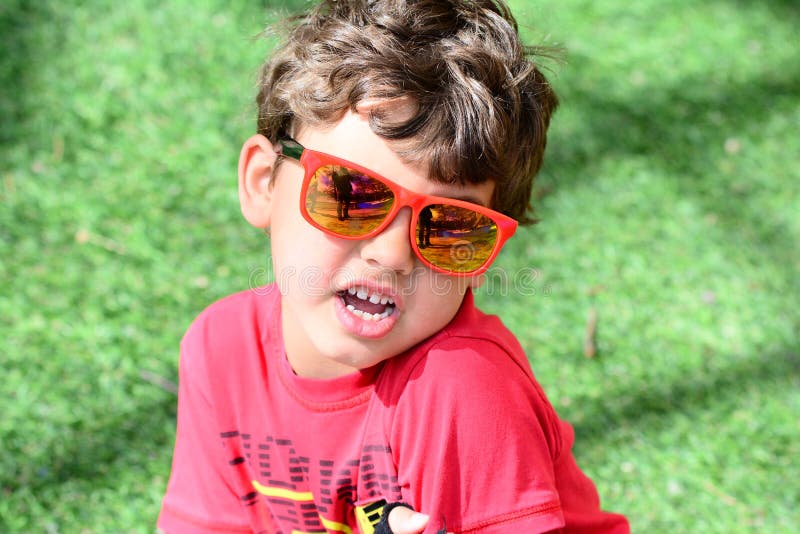 Kids dancing sunglasses stock image. Image of listening 35147235
