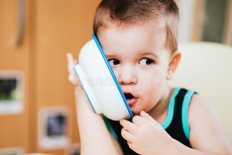 The Child Pretends that he is Speaking on the Phone Stock Image Image