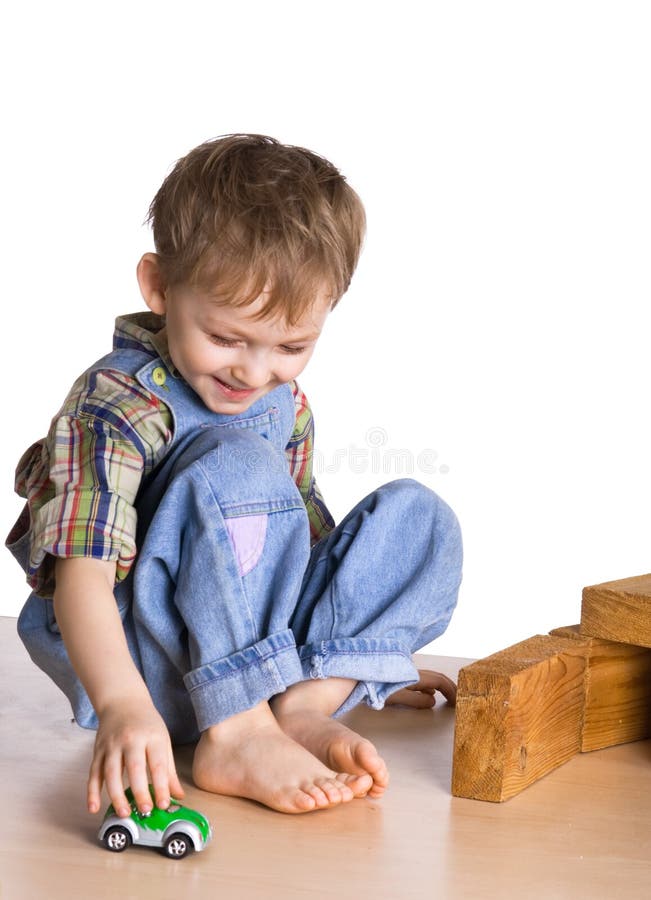 Kid plays with the toy car