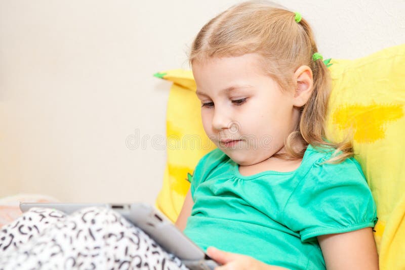 Kid Reading Electronic Book Stock Photo - Image of computers, little ...