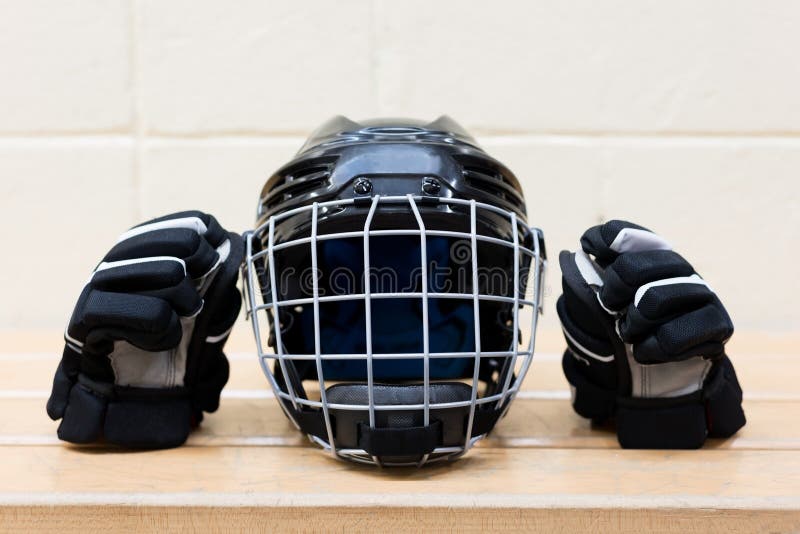 Elegance astronomy shell Kid`s Hockey Gear on the Bench: Black Hockey Helmet and Gloves. Stock Photo  - Image of plastic, isolated: 113775106